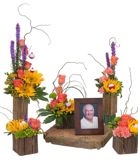 Natural containers and bright flowers to surround the photograph of a loved one. 