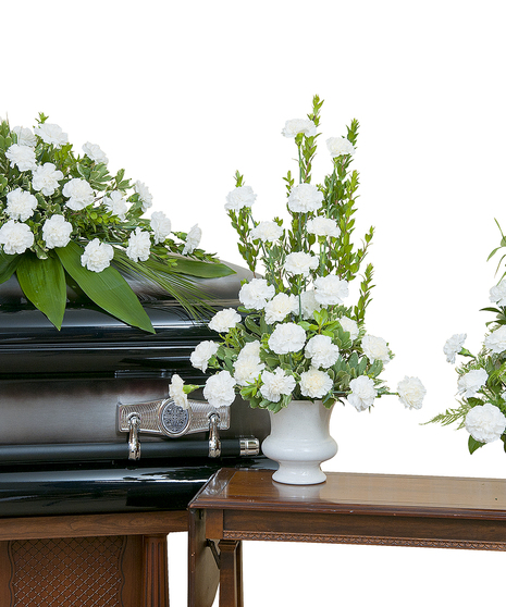 Three funeral flower arrangements: A white carnation casket spray, urn and tribute. 